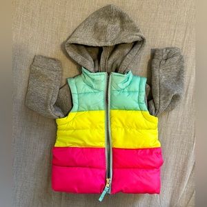 Insulated vest with fleece sleeves